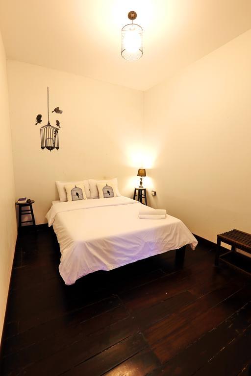 Luang Poj Boutique Hostel Ranong Værelse billede