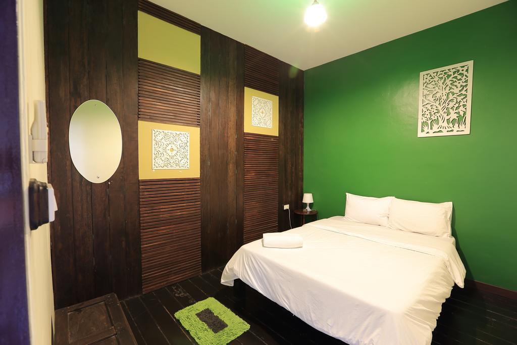 Luang Poj Boutique Hostel Ranong Værelse billede