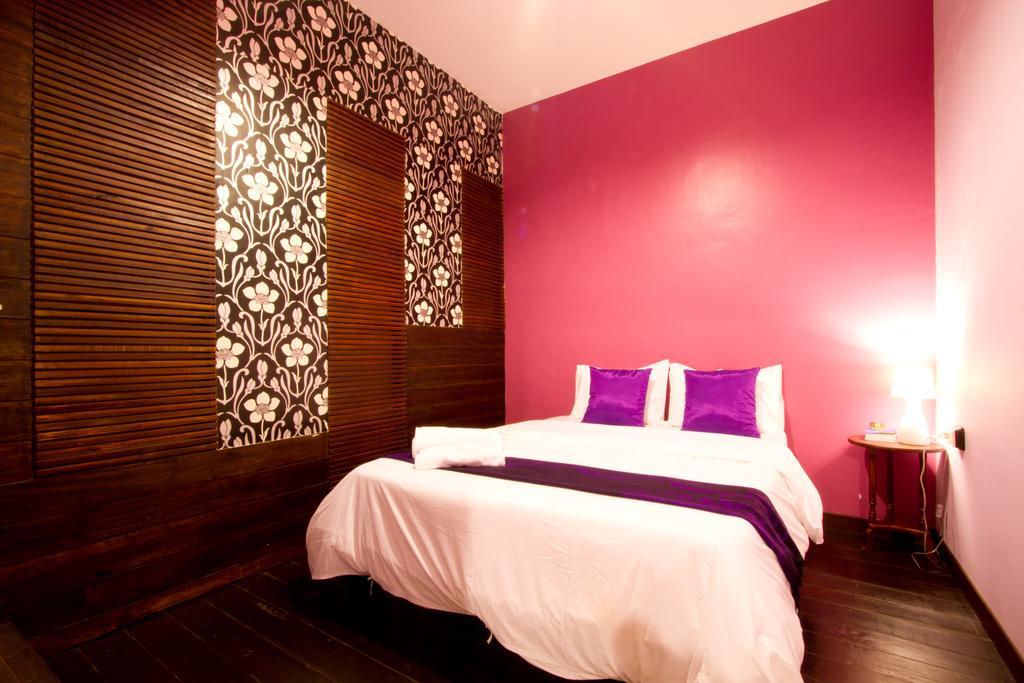Luang Poj Boutique Hostel Ranong Værelse billede
